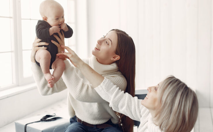 Elegant grandma at home with daughter and granddaughter